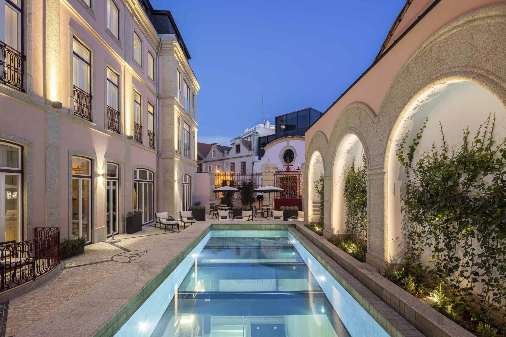 pool and exterior of Palacete de Valdemouro in Aveiro 